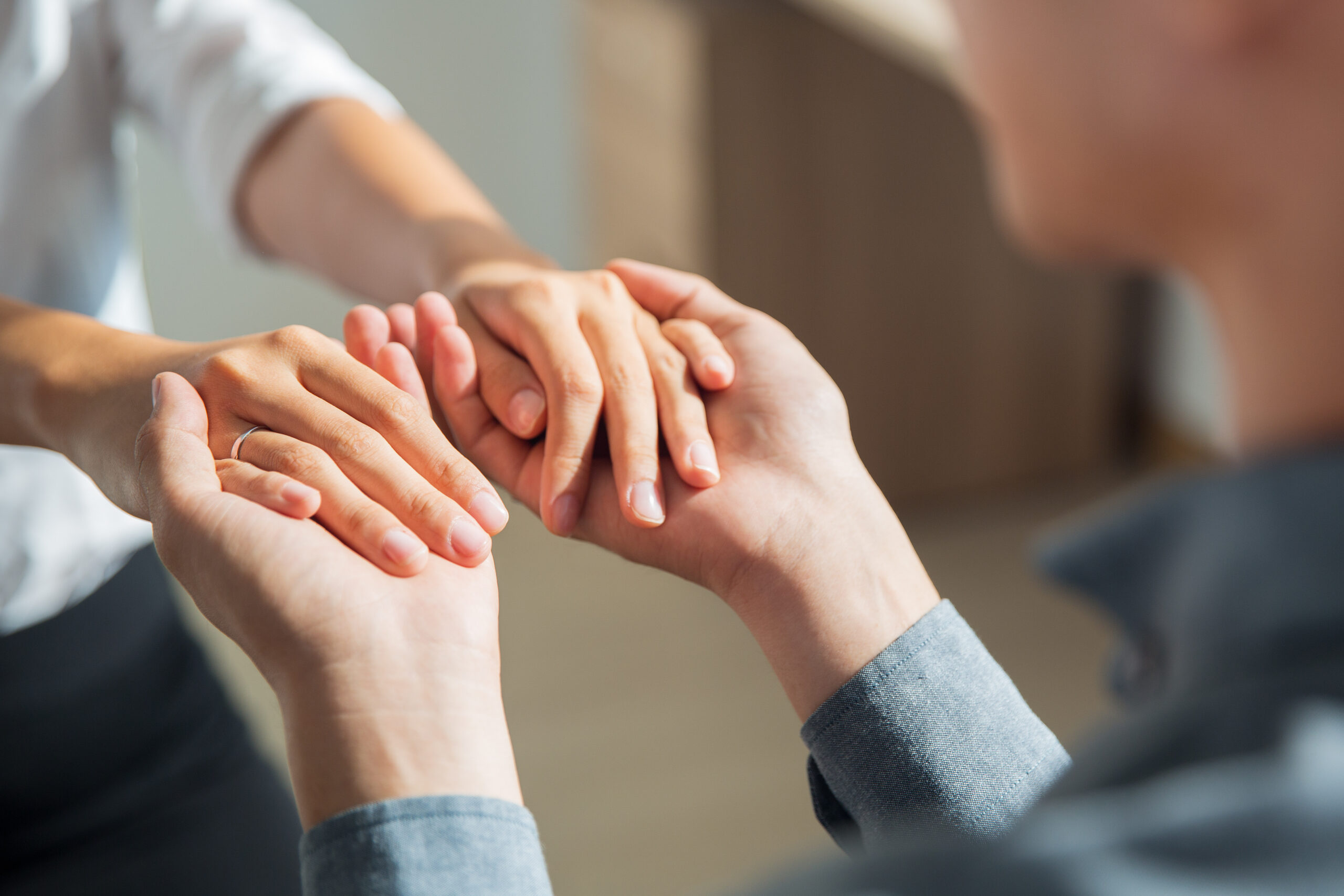 young man holding hands girlfriend scaled